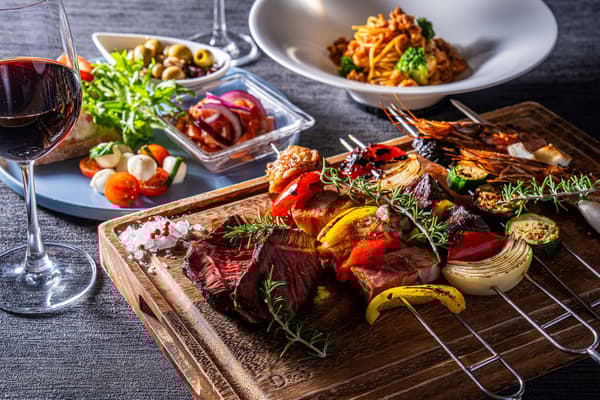 Antipasto plate with prosciutto, cheese, olives, and bruschetta