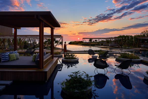 Infinity pool overlooking the sea at sunset