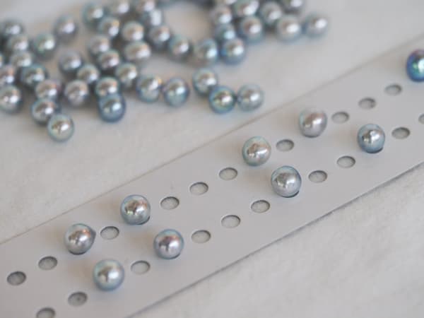 Trabajo de emparejamiento de perlas