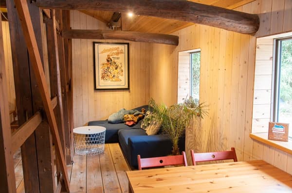 Interior with sofa seating and table counter seating, total 22 seats