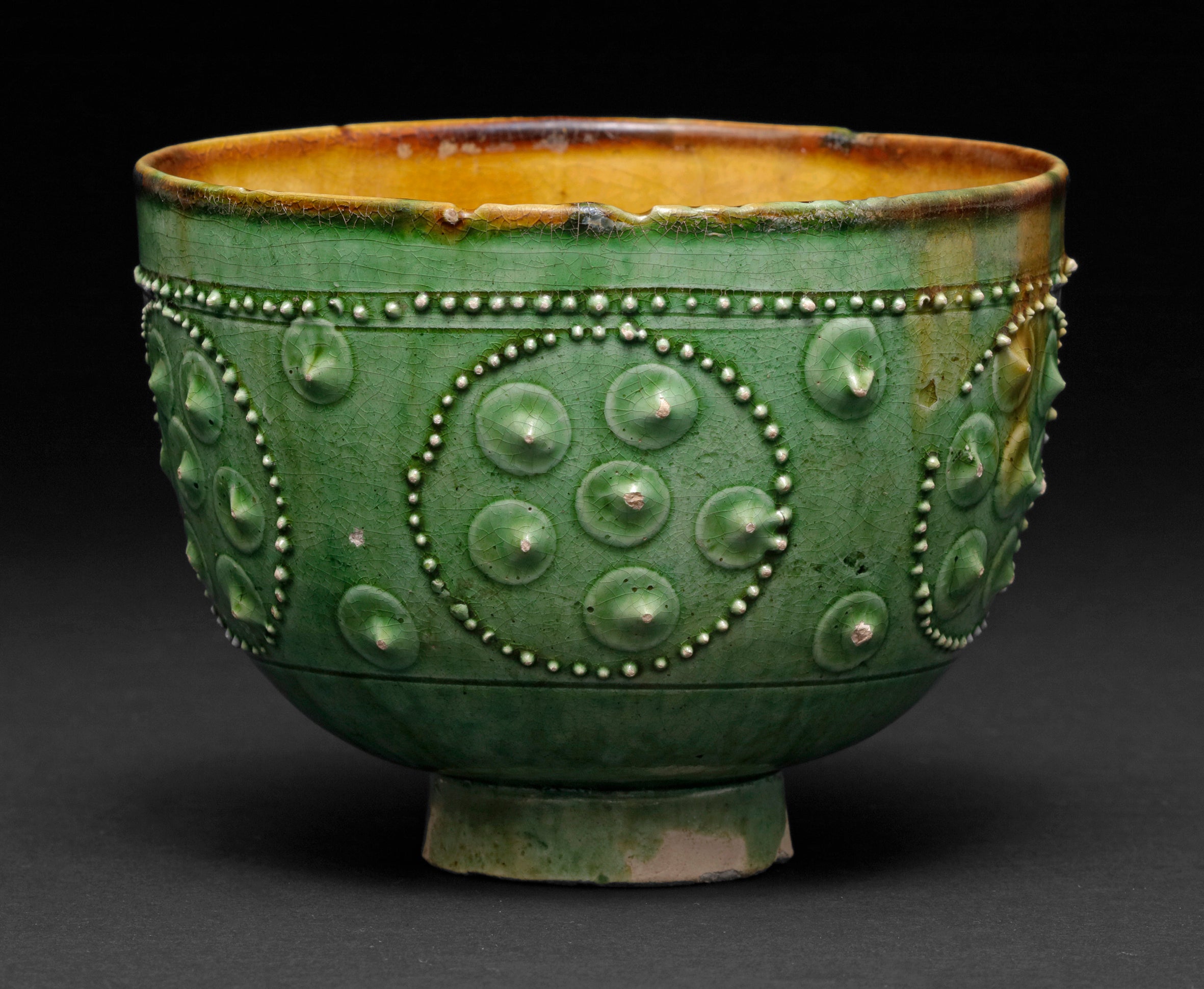 Green and Brown Glazed Bowl with Applied Beaded Design