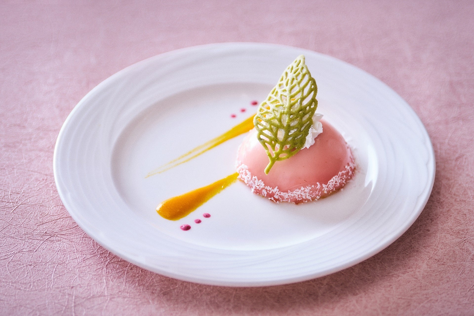 Almond mousse with cherry blossom and raspberry