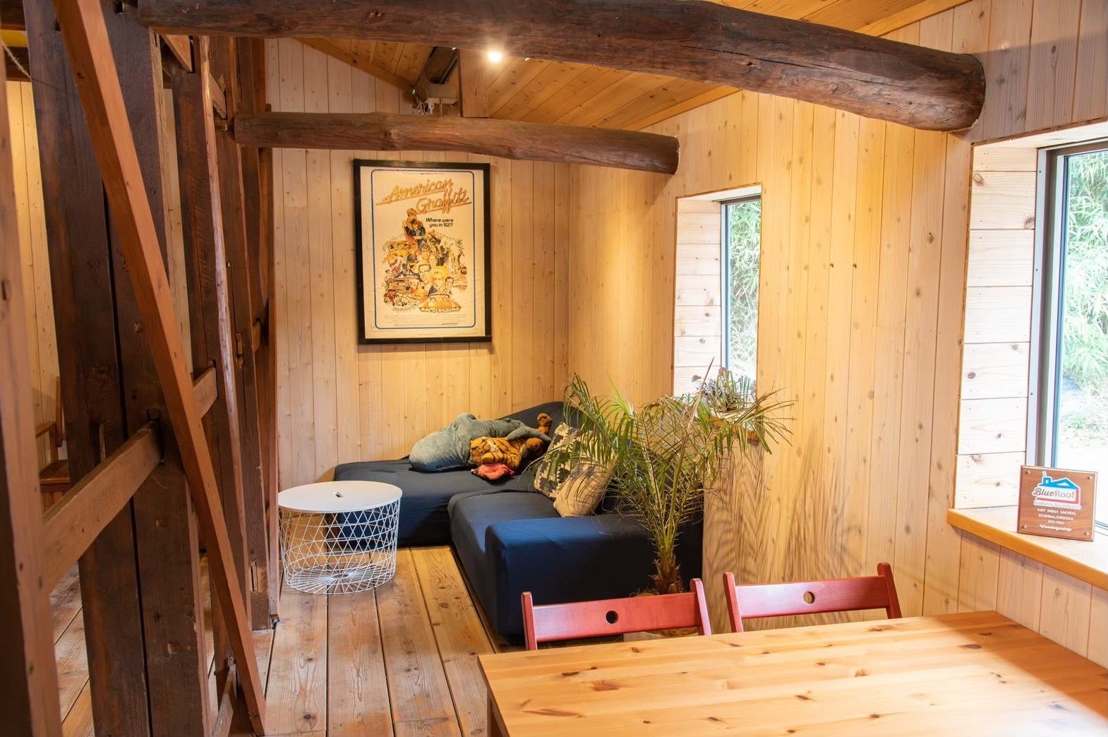 Interior with sofa seating and table counter seating, total 22 seats